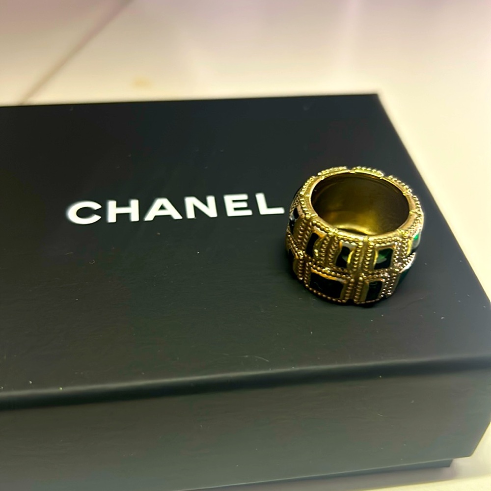 Chanel ring with green stones